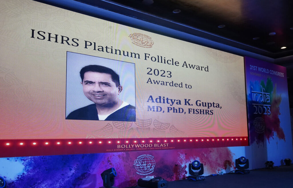 Dr. Aditya Gupta awarded the Platinum Follicle Award. 