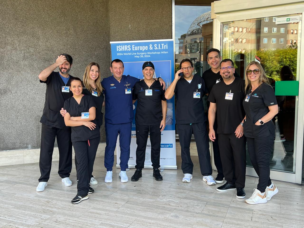 Europe live surgery workshop by ISHRS: Members posing for a photo.